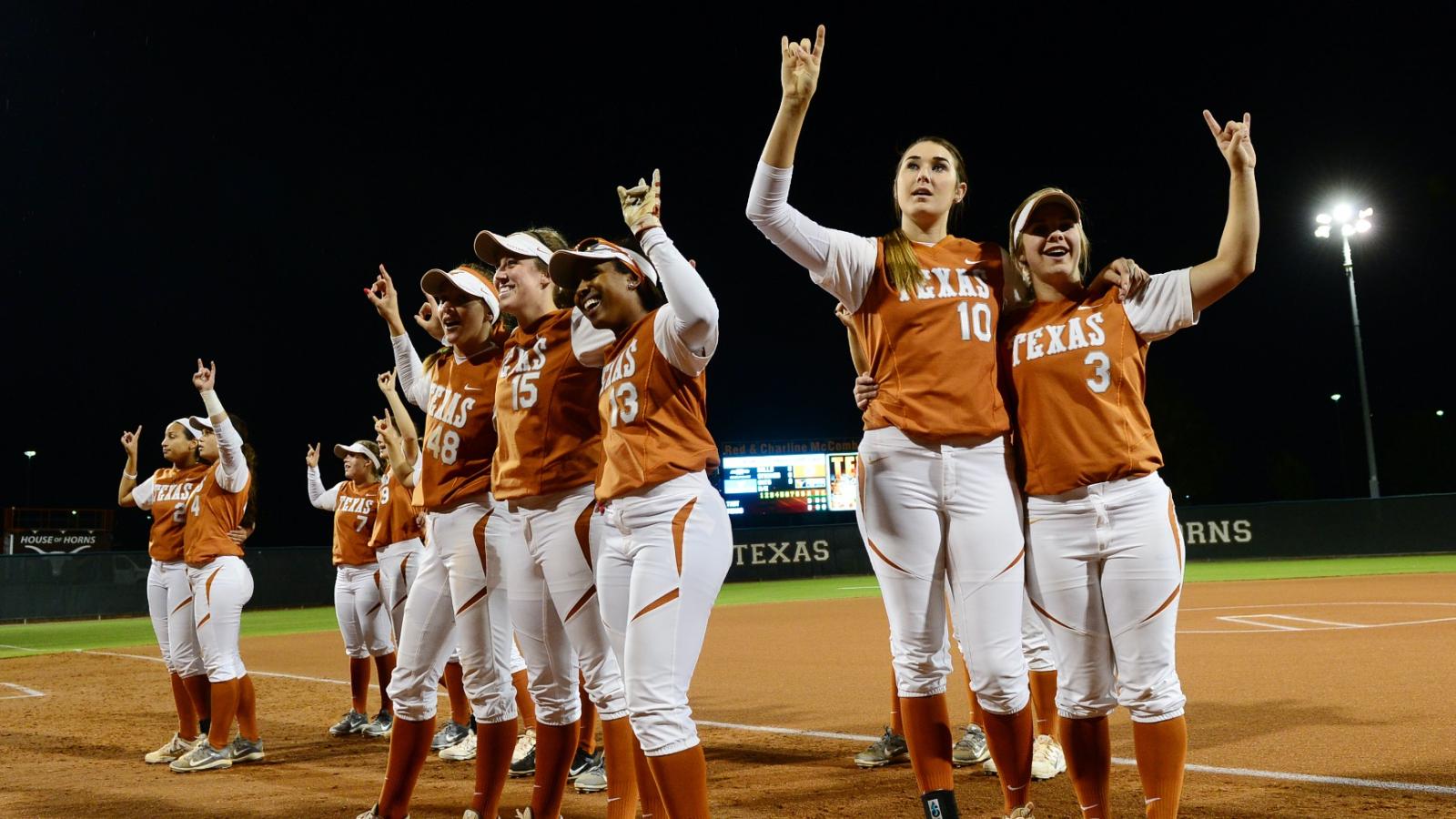 Longhorns baseball payers sing The Eyes of Texas to the crowd after the game