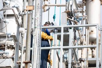 Worker at a carbon recapture facility