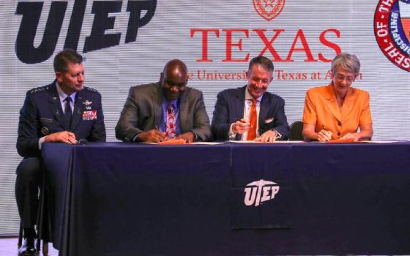 Gen. David D. Thompso, UTEP President Heather Wilson, UT Austin President Jay Hartzell and Archie Holmes Jr. sit at table